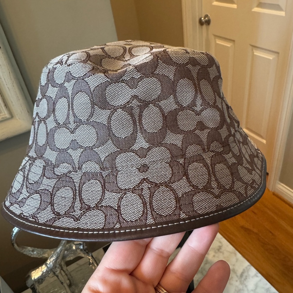 Coach - Bucket Rain Hat - EXCELLENT CONDITION - no signs of use.  Brown